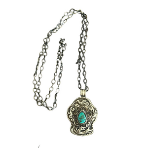Vintage silver pendant necklace with turquoise stone - intricate animal design